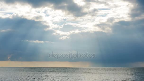 Tidal bore. Sunset at sea, the rays of the sun make their way through the clouds. time lapse — Stock Video