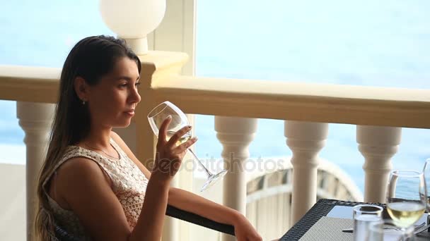 Waiter Serves Banquet Table. The girl in the restaurant. Drinking wine — Stock Video