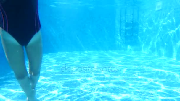 Children swim under water. 4k. Slow motion — Stock Video