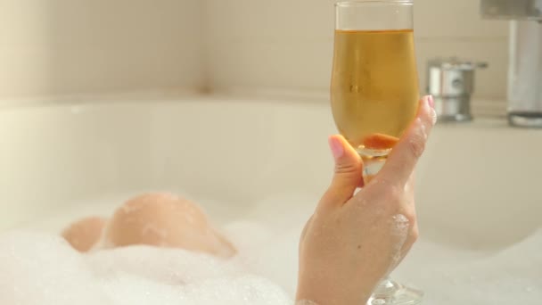 Woman blonde drinking wine while taking a bath. 4k, slow motion — Stock Video