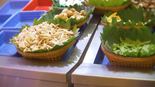 Showcase with sliced red fish on ice. Market. Fish in the shop window. Raw seafood is sold in the store. Closeup. 4k — Stock Video