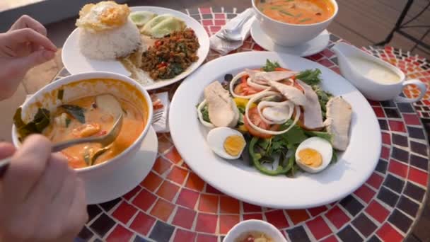 Prawn spicy soup is a Thai dish with sour and spicy taste. some are scooping prawn spicy soup. 4k, slow-motion, close-up — Stock Footage Prawn spicy soup is a Thai dish with sour and spicy taste. some are scooping prawn spicy soup. 4k, slow-motion, close-up Stock Footage