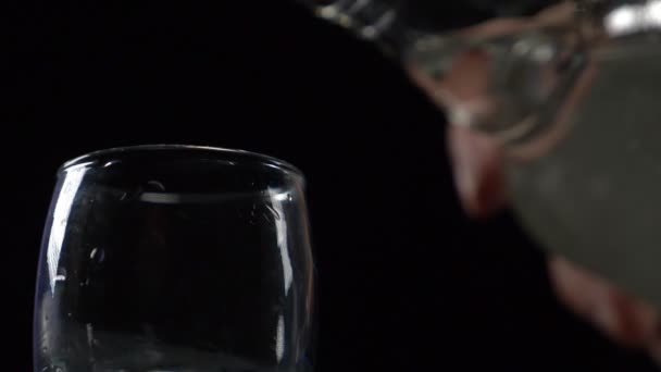 Vodka is poured into a stack — Stock Video