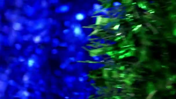 Abstract background, close-up. shiny christmas tinsel. blur, selective focus. — Stock Video