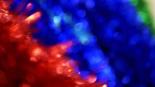 Abstract background, shiny christmas tinsel. blur, selective focus. copy space — ストック写真