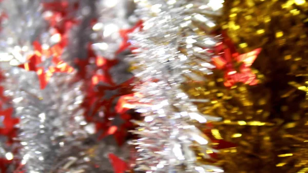 Abstract background, shiny christmas tinsel. blur, selective focus. copy space — ストック写真