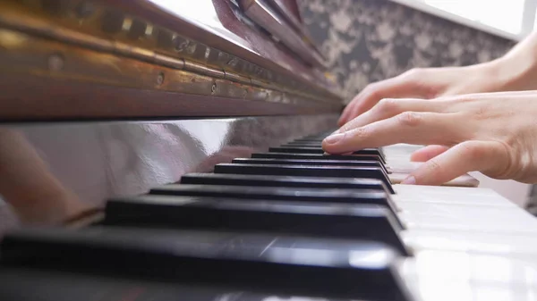 Closeup. male hands playing the piano. copy space. — Stock Photo, Image