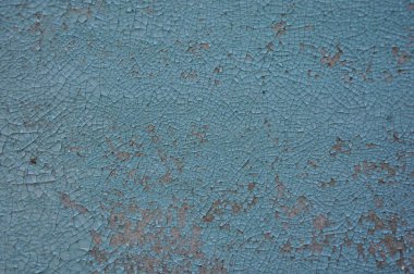 Mavi çatlamış boyanın arkaplan dokusu.