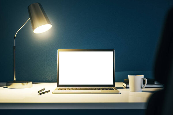 Blank laptop screen on a wooden table with cup of coffee and glowing lamp at night, mockup. 3D Rendering