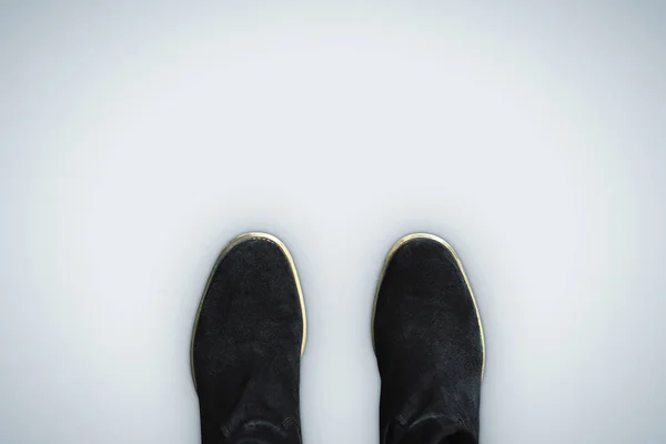 コピースペースと白の背景に隔離された黒のカジュアルな靴のトップビュー — ストック写真