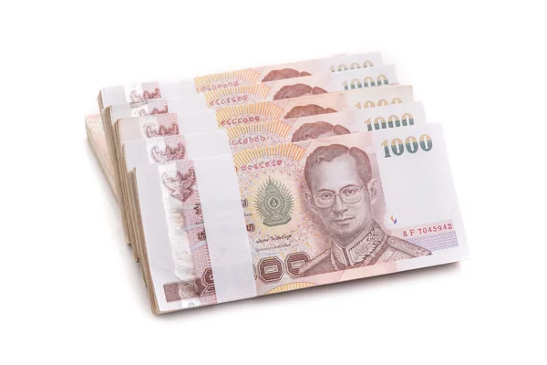 Pila di denaro tailandese isolato su sfondo bianco — Foto Stock