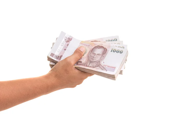 Hand geven van Thaise bankbiljetten. Studio schot geïsoleerd op witte backgr — Stockfoto