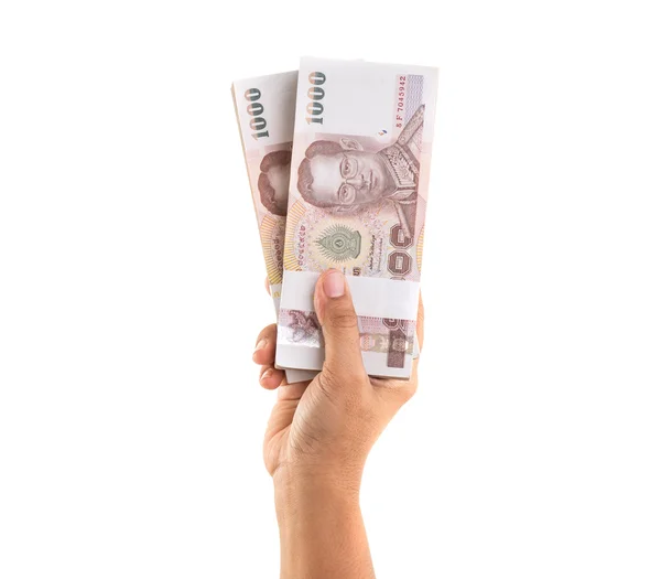 Hand geven van Thaise bankbiljetten. Studio schot geïsoleerd op witte backgr — Stockfoto