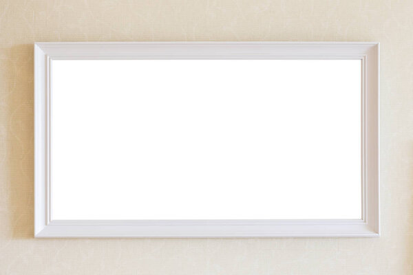 Empty white wooden photo frame on the wall. Room interior decoration. Saved with clipping path