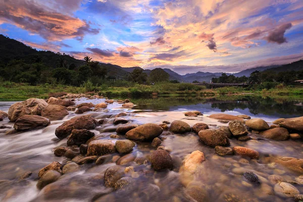 Small river and beautiful sunset in Kiriwong village. The best O — Stock Photo, Image