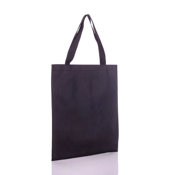 Black cotton bag. Studio shot isolated on white — Stock Photo, Image