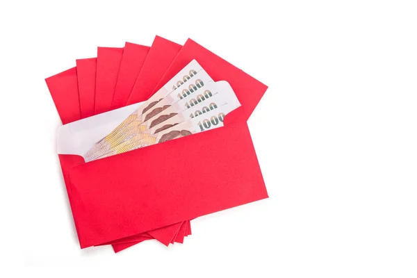 Rode envelop gebruik in Chinees Nieuwjaar festival op wit — Stockfoto