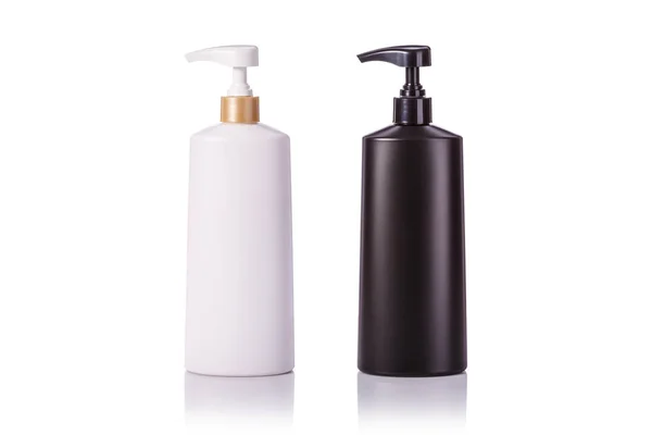 Blank white and black plastic pump bottle used for shampoo or so — Stock Photo, Image