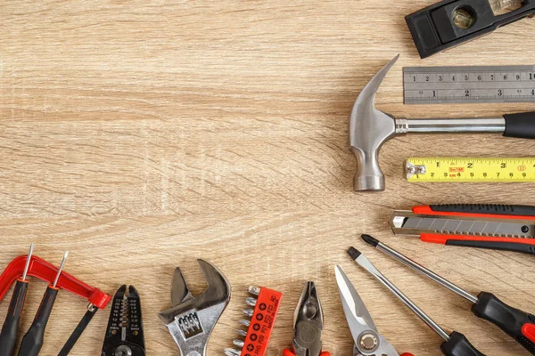 New of assorted work tools on wood with copy space for text — Stock Photo, Image