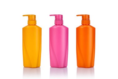 Shamp için kullanılan boş sarı, pembe ve turuncu plastik pompa şişe