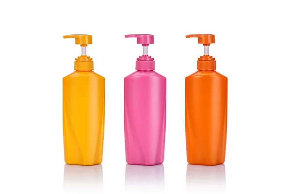 Κενό κίτρινο, ροζ και πορτοκαλί πλαστικό αντλία μπουκάλι χρησιμοποιείται για shamp — Φωτογραφία Αρχείου
