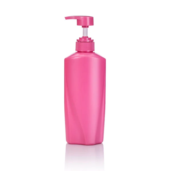 Frasco de bomba de plástico rosa em branco usado para shampoo ou sabão. Estúdio — Fotografia de Stock