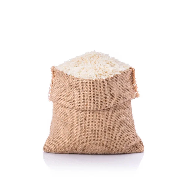 Thai jasmine rice in small sack. Studio shot isolated on white b — Stock Photo, Image