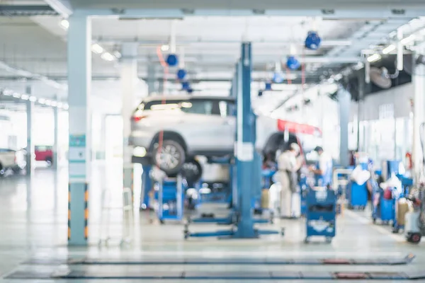 Bulanık görüntü: tamir dükkanı, ga arabada araba teknisyen