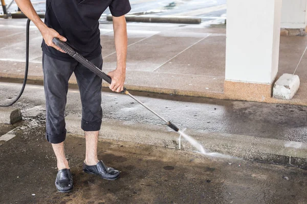 Outdoor floor cleaning with high pressure water jet — Stock Photo, Image