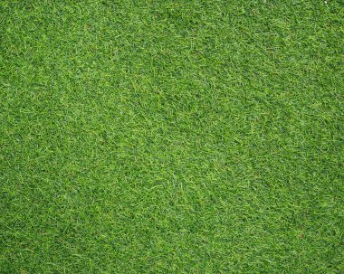 Parlak yeşil suni çim arka plan ve tasarım için kullanabilirsiniz.
