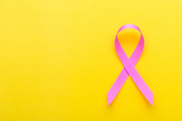 Breast Cancer concept : Pink ribbon symbol of breast cancer on y — Stock Photo, Image