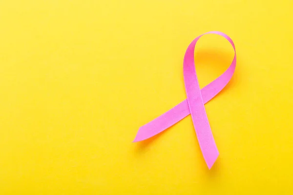 Breast Cancer concept : Pink ribbon symbol of breast cancer on y — Stock Photo, Image