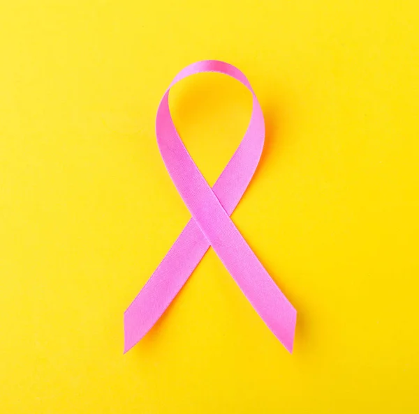 Breast Cancer concept : Pink ribbon symbol of breast cancer on y — Stock Photo, Image