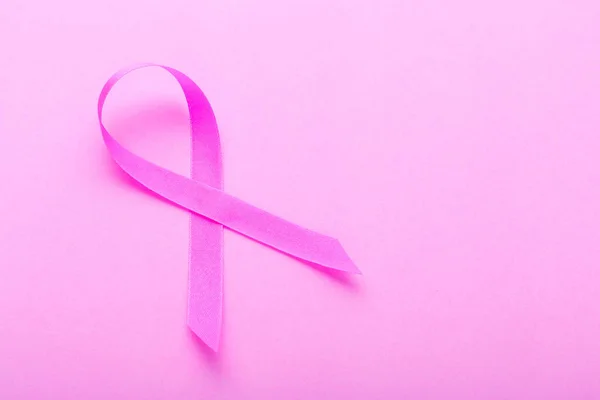 Breast Cancer concept : Pink ribbon symbol of breast cancer on p — Stock Photo, Image