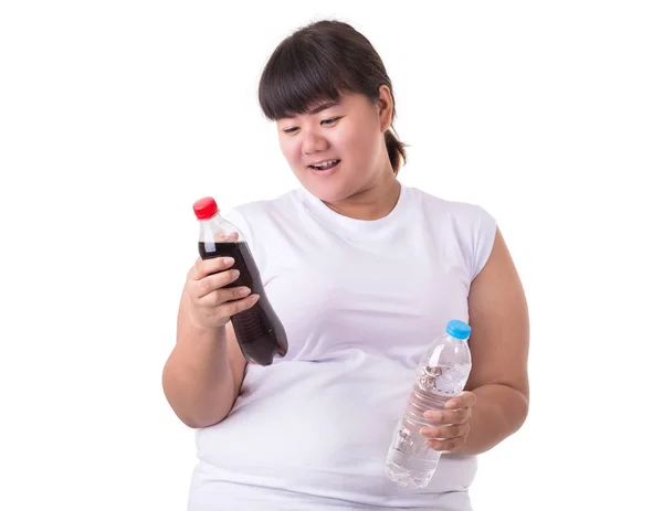 脂肪アジアの女性の白い t シャツを着て、ソフトド リンクを選択または — ストック写真