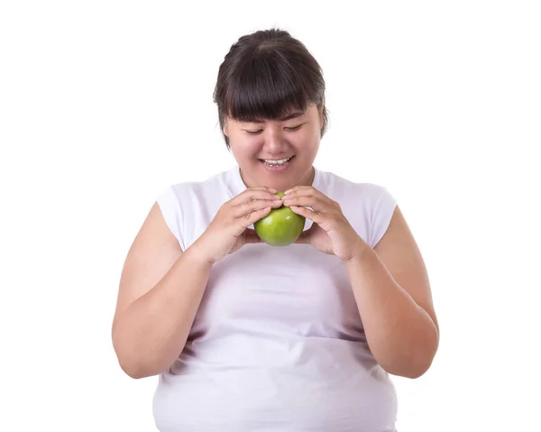 胖亚裔妇女穿白色 t恤和吃绿色苹果 iso — 图库照片