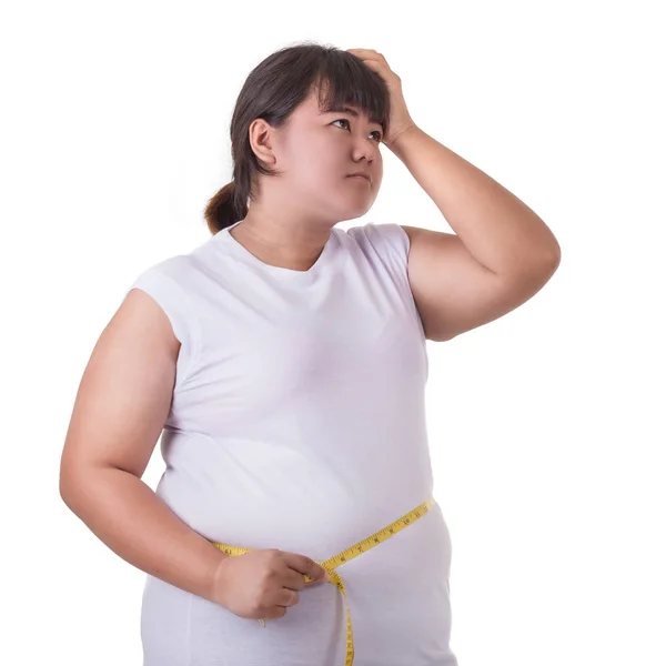 Gorda asiática mujer usar blanco camiseta y comprobar su cuerpo tamaño wi —  Fotos de Stock