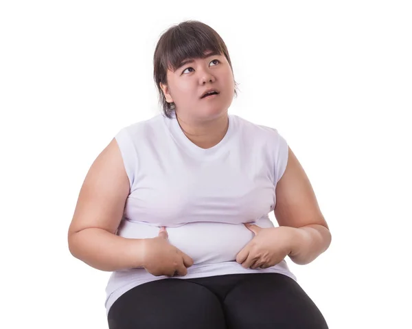 胖亚裔女人穿白色 t-shirt 担心她的体型 — 图库照片