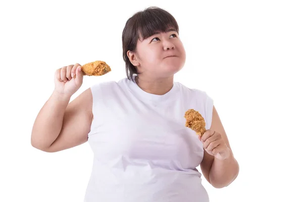 Grasa asiático mujer holding y comer frito pollo aislado en whi —  Fotos de Stock