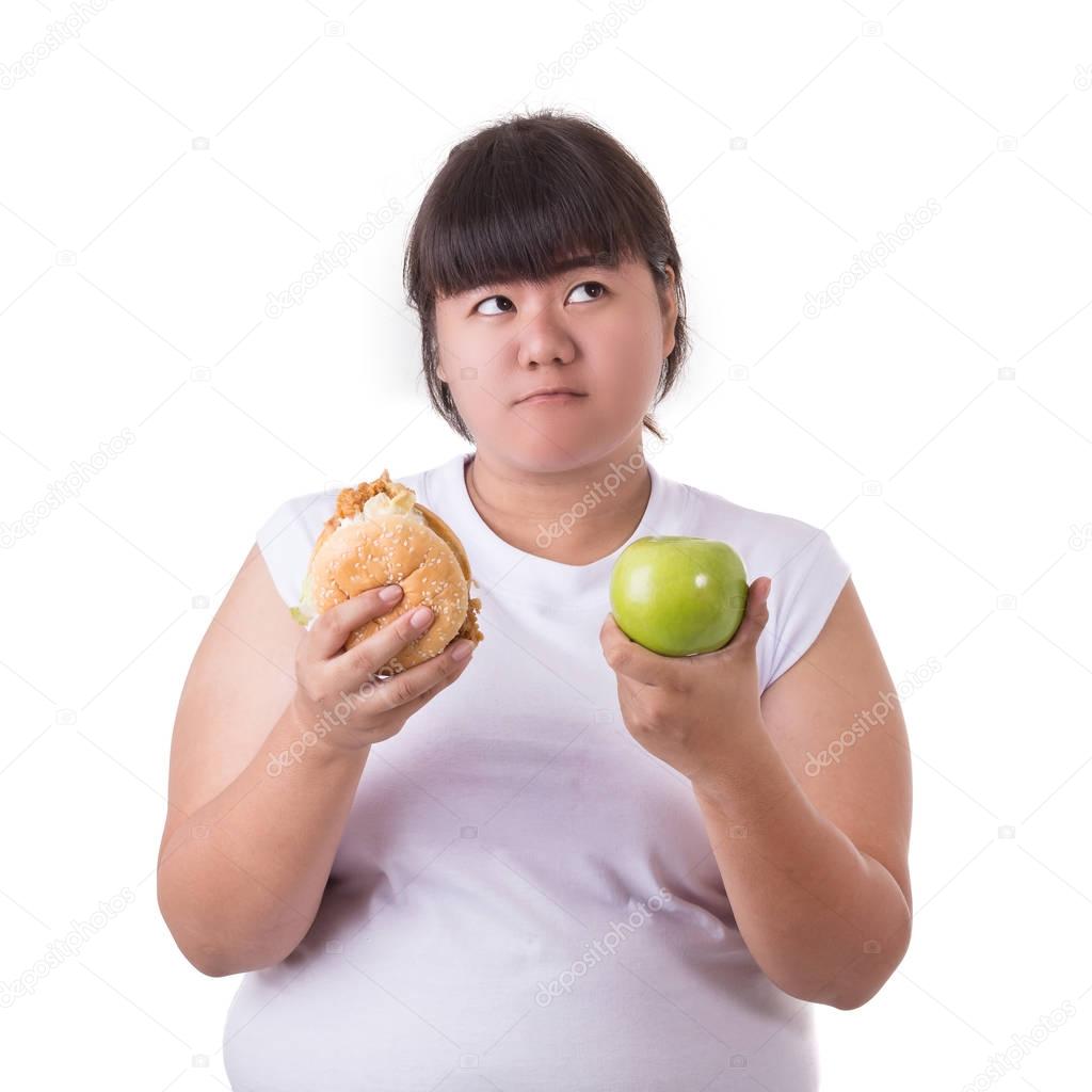 Fat asian woman wearing white t-shirt and choosing to eat fried 