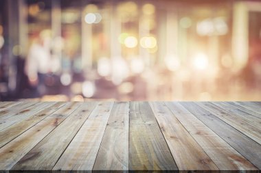 Ahşap tahta veya tablo ve soyut arka plan bulanık. Ücretsiz girintili