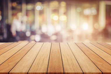 Ahşap tahta veya tablo ve soyut arka plan bulanık. Ücretsiz girintili