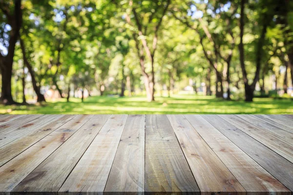 Wooden board or table and abstract blurred background. Free spac — Stock Photo, Image