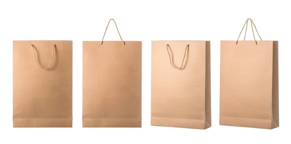 ショッピング用の新しい空白の茶色の紙袋のセット 白い背景に隔離されたスタジオショット — ストック写真