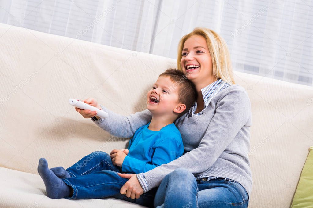 Mother and son  watching tv