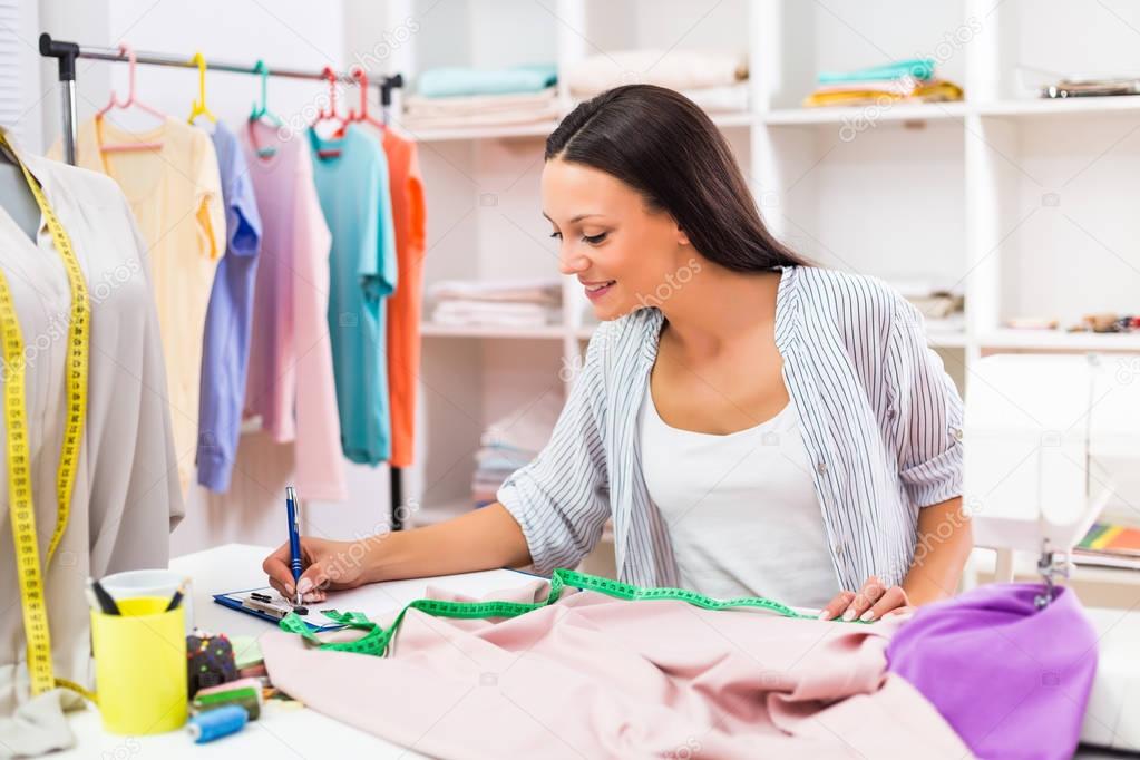 Beautiful  seamstress working 