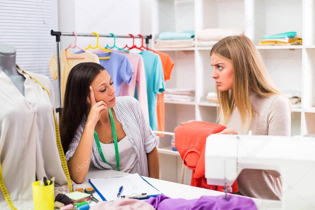 Angry customer with seamstress