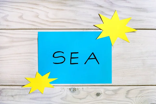 Word Sea Sun Shapes Wooden Table Image Intentionally Toned — Stock Photo, Image