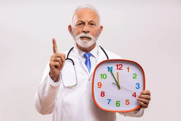 Portrait Senior Doctor Holding Clock Scolding Gray Background — Stock Photo, Image