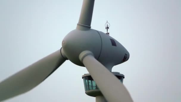 Closeup of Wing Turbine Generator against clody sky — Stock Video